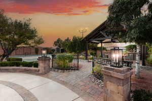 Patio terrace at dusk featuring a patio