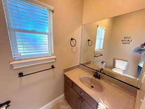 Half bath off of laundry room.