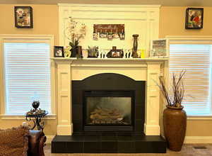 Cozy Custom wood surround gas fireplace.