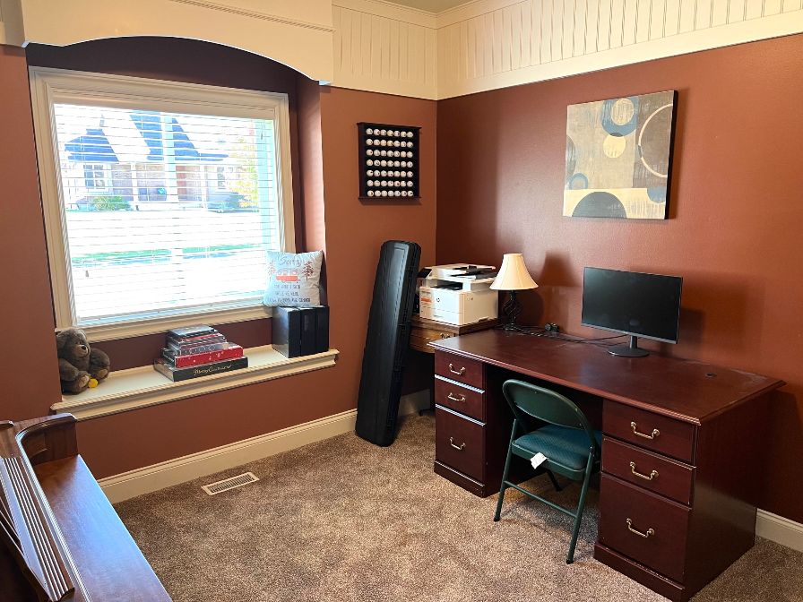 Office or bedroom on the main floor. Morning sun.Closet organizer.