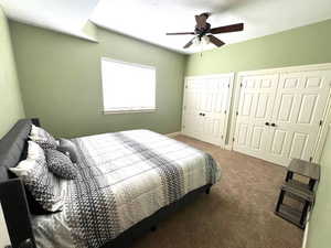 One of two bedrooms downstairs, this one with new carpet, ceiling fan and double closet for storage.