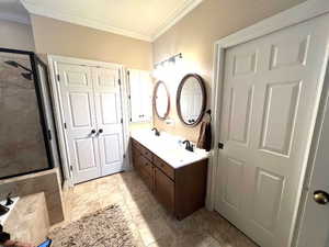 Double vanity, linen closet and walk in closet.