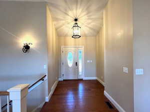 Welcoming and well lighted foyer.