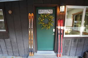 Entrance to property with board and batten siding