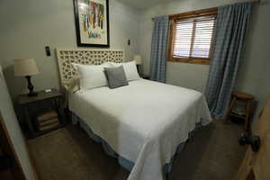 Bedroom featuring carpet