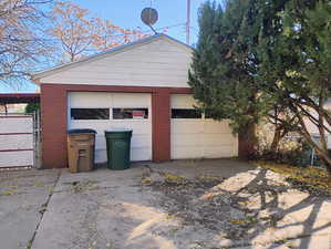 Detached garage with a gate