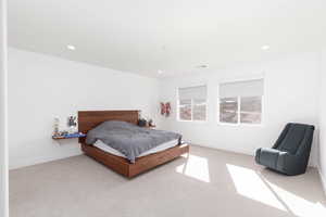 Bedroom featuring carpet floors and recessed lighting