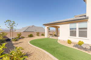 Fenced backyard featuring a patio area
