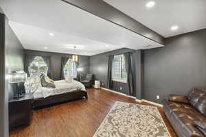 Bedroom featuring wood finished floors and recessed lighting