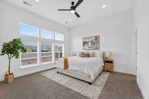 Primary bedroom with private en'suite  and walk in closet.