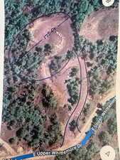 Bird's eye view - Before & After of new, improved driveway & pad