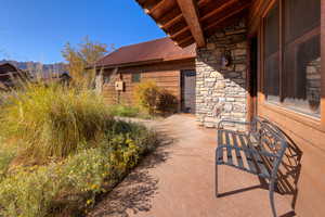 View of patio / terrace with a mountain view