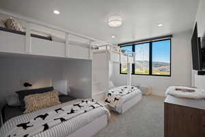 Carpeted bedroom featuring recessed lighting and baseboards