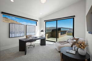 Office with vaulted ceiling, carpet floors, and recessed lighting