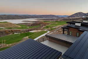 Mountain view featuring a large body of water