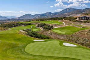 View of community featuring golf course view and a mountain view