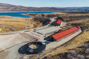 View from above of property featuring a water and mountain view