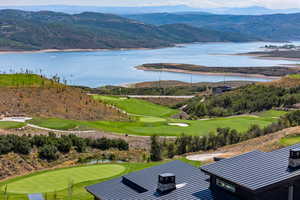 Aerial view of a water and mountain view and a local golf course