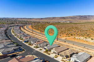 Aerial view of residential area with mountains