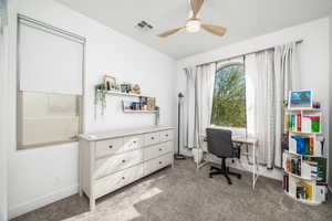Office featuring light colored carpet and a ceiling fan