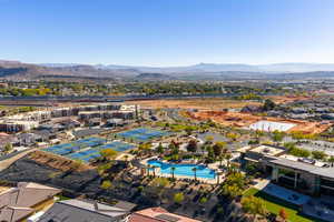 Aerial view of a pool area and mountains