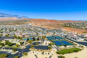Aerial view of residential area featuring a mountain backdrop
