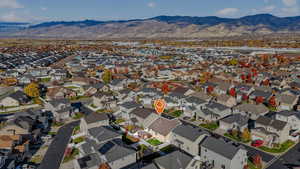 View of property location with a mountain backdrop and nearby suburban area