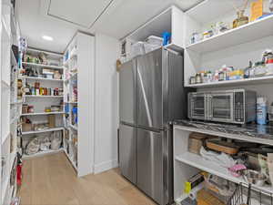 walk-in pantry with extra fridge