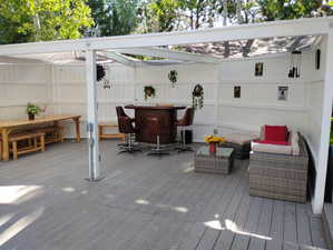 Wooden deck with outdoor lounge area