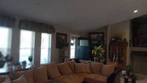 Living room with lofted ceiling