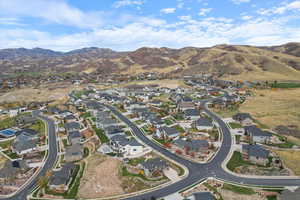 View of property location with nearby suburban area and a mountainous background