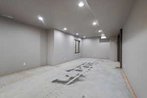 Finished below grade area featuring recessed lighting