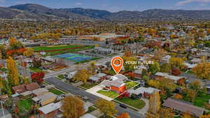 Aerial view of residential area with mountains