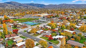 Aerial view of residential area featuring a mountainous background