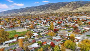 Aerial view of residential area featuring mountains