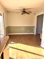 Unfurnished room with light wood-style floors and ceiling fan