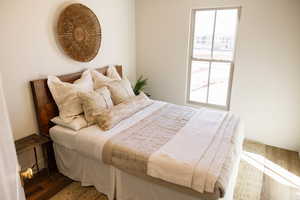 Bedroom featuring wood finished floors