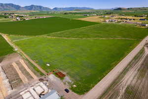 View of rural area with extensive farmland and mountains