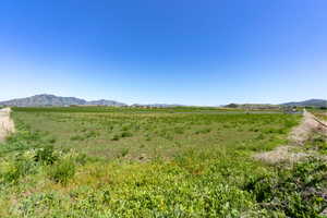 View of mountain background featuring rural landscape