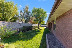 View of fenced backyard