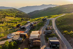 Aerial view at dusk of a mountain view and a view of trees