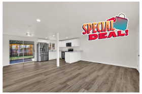 Unfurnished living room with dark wood-style floors and recessed lighting