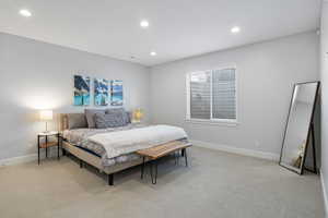 Bedroom with carpet flooring and recessed lighting