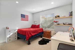 Bedroom with carpet flooring and recessed lighting