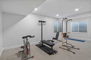 Exercise area featuring carpet and recessed lighting