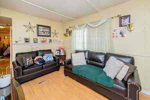 Living area featuring wood finished floors