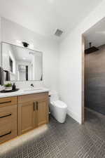 Full bathroom with vanity and walk in shower