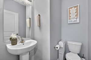 Bathroom with toilet and a sink