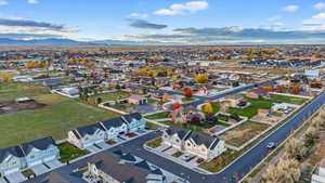 Aerial view of residential area with a mountainous background