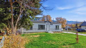 View of front of home with a mountain view